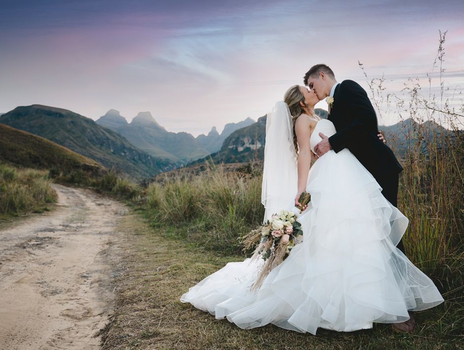 Bride being kissed by groom