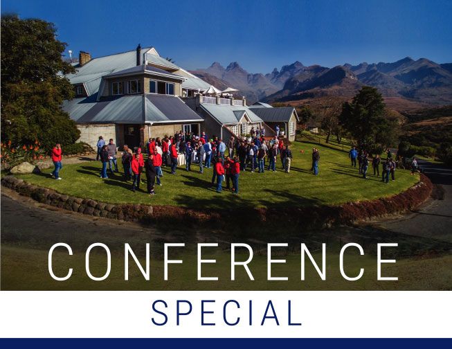 People gathering for a conference outside Cathedral Peak Hotel