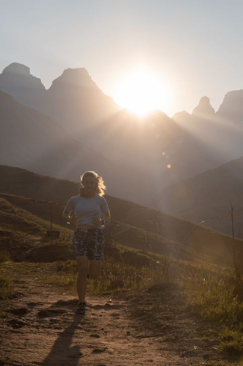 Woman running cross country